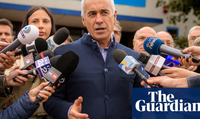 Shock in Romania as hard-right Nato critic Calin Georgescu takes lead in presidential election