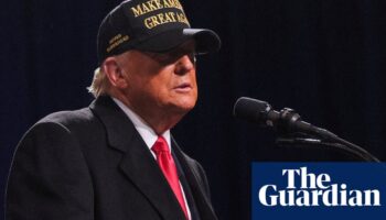 Trump leans into anti-migrant rhetoric at final Georgia rally as early voting puts state on a knife-edge