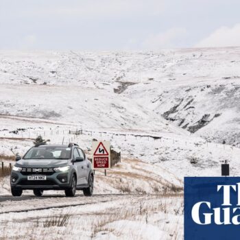 UK weather: snow and ice warning as commuters face widespread disruption