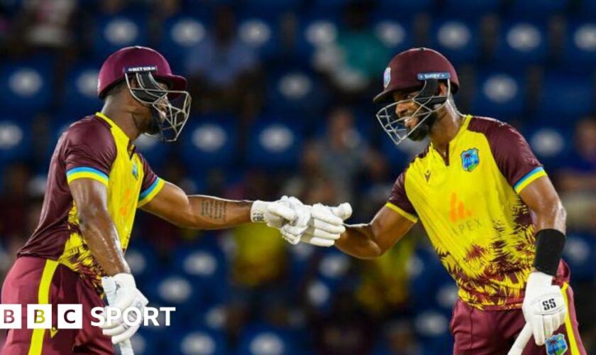 Evin Lewis and Shai Hope bump fists during their partnership of 136 v England