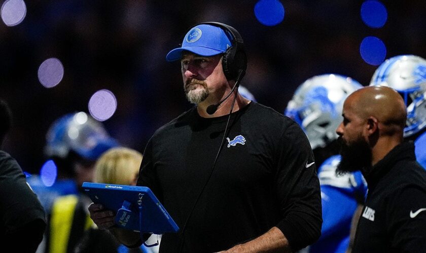 Dan Campbell acknowledges Lions' Dan Skipper as he vomits during impassioned postgame victory speech