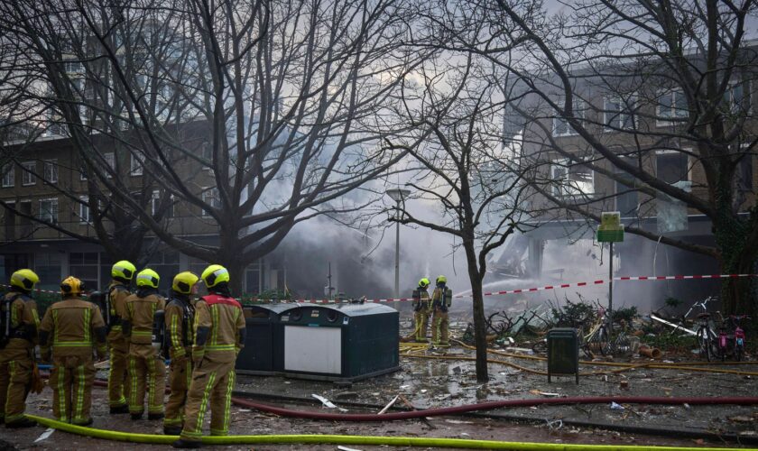 Firefighters at the scene in The Hague. Pic: AP