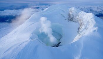 Mount Spurr is a 11,100ft (3,383m) stratovolcano around 80 miles (129km) away from the city of Alaska. Pic: Alaska Volcano Observatory, US Geological Survey/AP