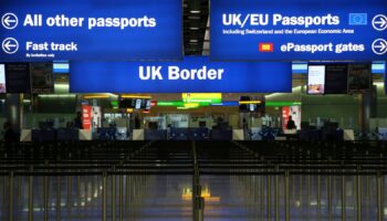 UK Border control is seen in Terminal 2 at Heathrow Airport in London June 4, 2014. REUTERS/Neil Hall