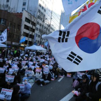 South Korean investigators request impeached president to appear for questioning over martial law