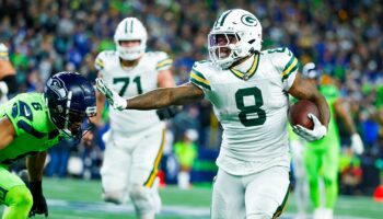 Packers handle Seahawks to maintain playoff spot; Geno Smith leaves game with knee injury