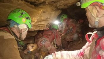 Rescuers working to free researcher trapped deep inside cave