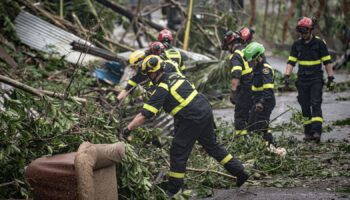 Rescue workers operate in storm-hit Mayotte, France, in this handout image obtained by Reuters on December 16, 2024. UIISC7/Securite Civile/Handout via REUTERS    THIS IMAGE HAS BEEN SUPPLIED BY A THIRD PARTY. NO RESALES. NO ARCHIVES