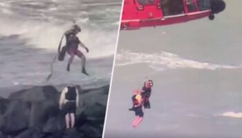 Missing Florida jet skier found clinging to rocks off St. Lucie Inlet in dramatic rescue: video