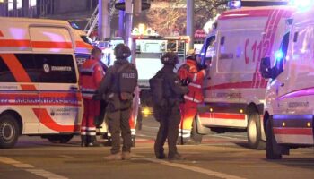 At least two dead after car ploughs 400m into crowded Christmas market in Germany