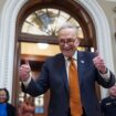 Senate Majority Leader Chuck Schumer, D-N.Y., celebrates as the Senate begins voting on the government funding bill just in time to meet the midnight deadline, at the Capitol in Washington, Friday, Dec. 20, 2024. (AP Photo/J. Scott Applewhite)