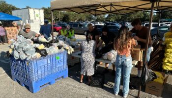 'Everyday people,' hungry and hurting, receive free meals in Florida