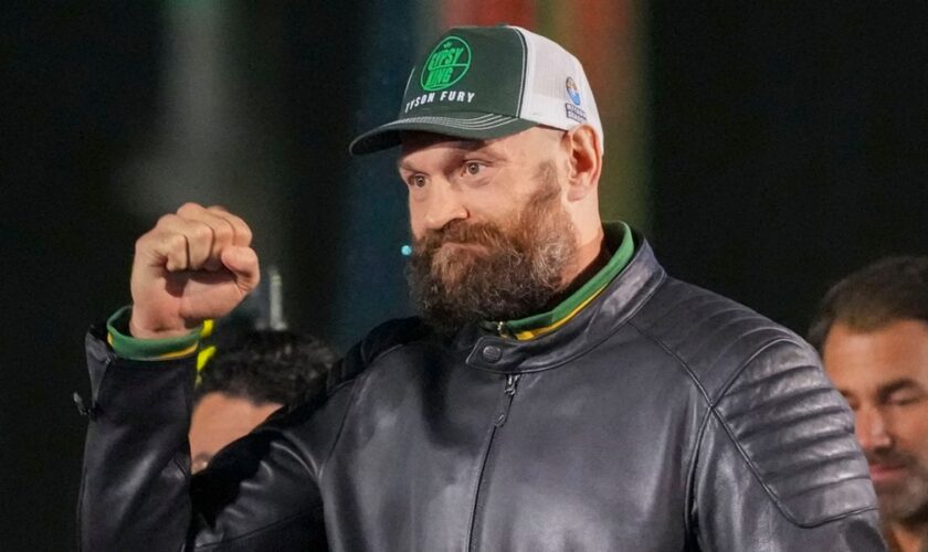 Britain's Tyson Fury arrives for the weigh-in of his WBA, WBO, and WBC heavyweight title boxing bout against World Champion Ukraine's Oleksandr Usyk in Riyadh, Saudi Arabia, Friday, Dec. 20, 2024. (AP Photo/Frank Augstein)