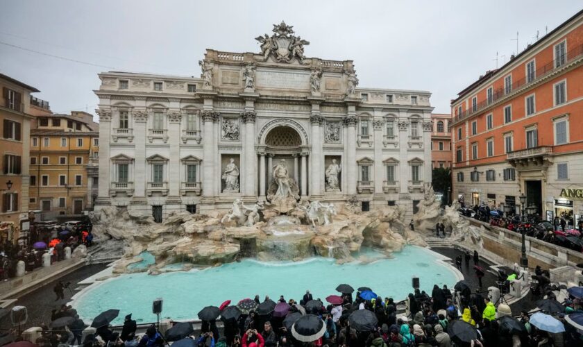 Rome's iconic Trevi Fountain reopens after renovation work in time for the Jubilee Holy Year