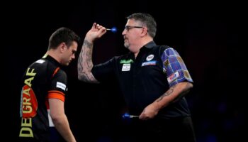 Unhappy birthday: Former champion Gary Anderson bows out of World Championship