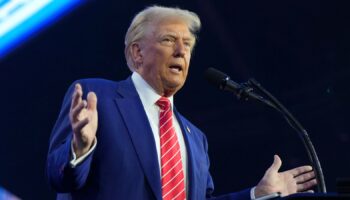 President-elect Donald Trump speaks at AmericaFest, Sunday, Dec. 22, 2024, in Phoenix. (AP Photo/Rick Scuteri)