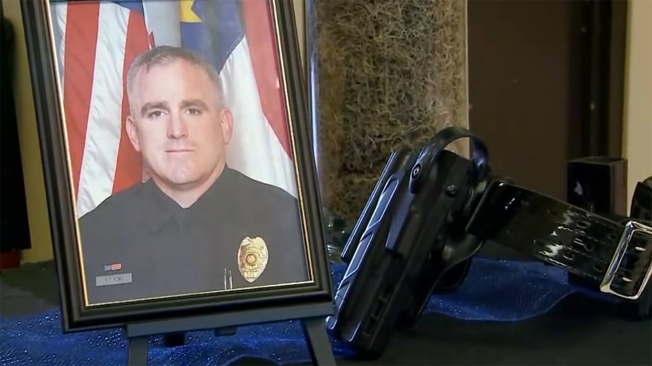 Police officer killed in North Carolina grocery store shooting just days before Christmas