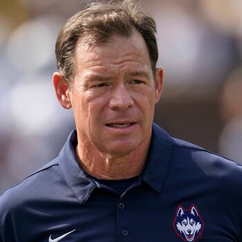 UConn's Jim Mora warns schools to 'think hard before you tamper with our players'