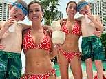 Coleen Rooney shows off the results of those jungle squats as she flashes her jaw-dropping figure in a floral red bikini in post-I'm A Celeb snap at Australia hotel with son Cass, six