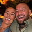 Conor McGregor and his fiancee Dee Devlin are all smiles as they enjoy 'date night' weeks after UFC fighter lost civil sexual assault case