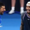 Novak Djokovic and Nick Kyrgios laugh during their Brisbane International doubles match