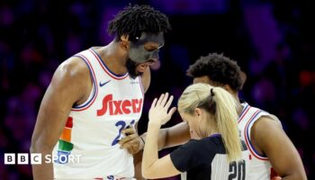 Joel Embiid, of the Philadelphia 76ers, confronts referee Jenna Schroeder in his side's win against the San Antonio Spurs