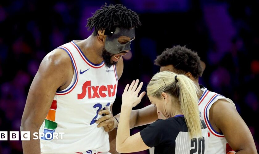 Joel Embiid, of the Philadelphia 76ers, confronts referee Jenna Schroeder in his side's win against the San Antonio Spurs