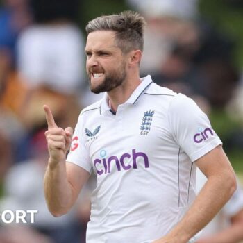 Chris Woakes celebrates a wicket