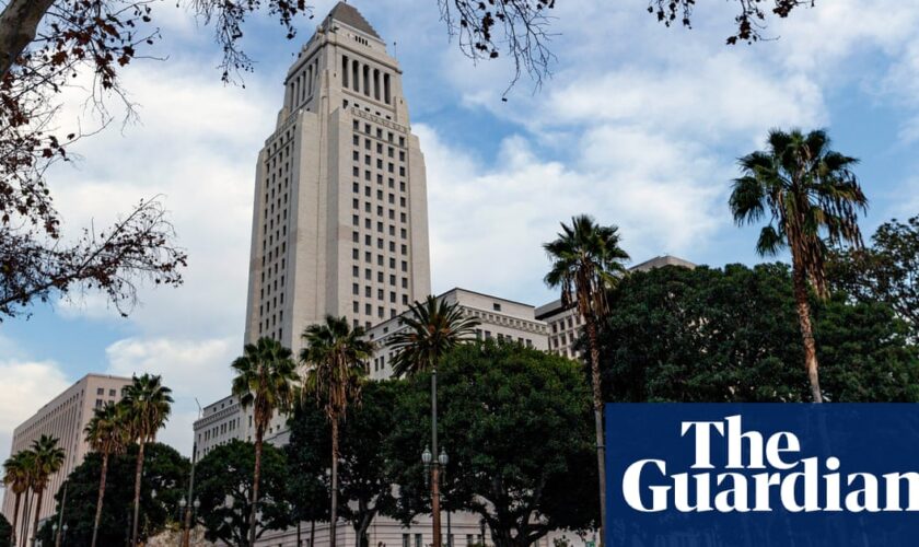 FBI searches home of LA deputy mayor accused of making city hall bomb threat