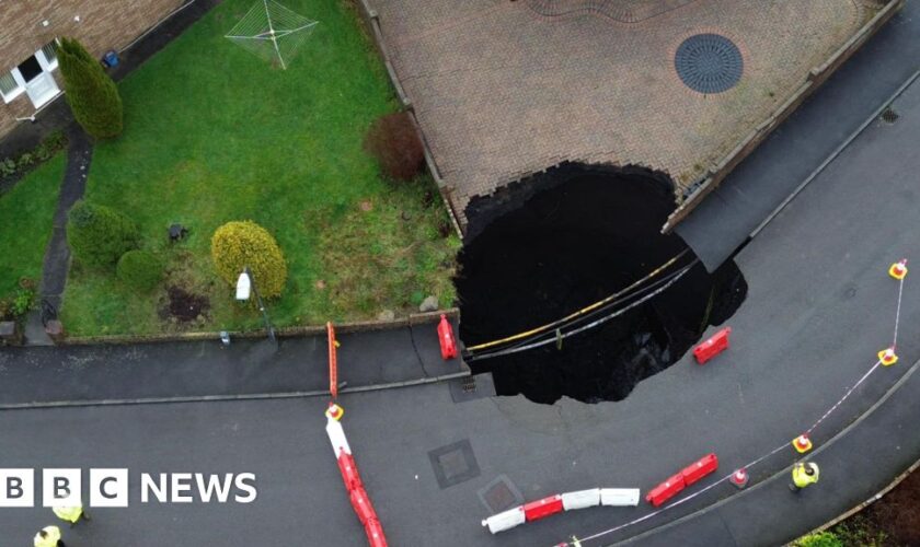 Homes evacuated after sinkhole opens on estate