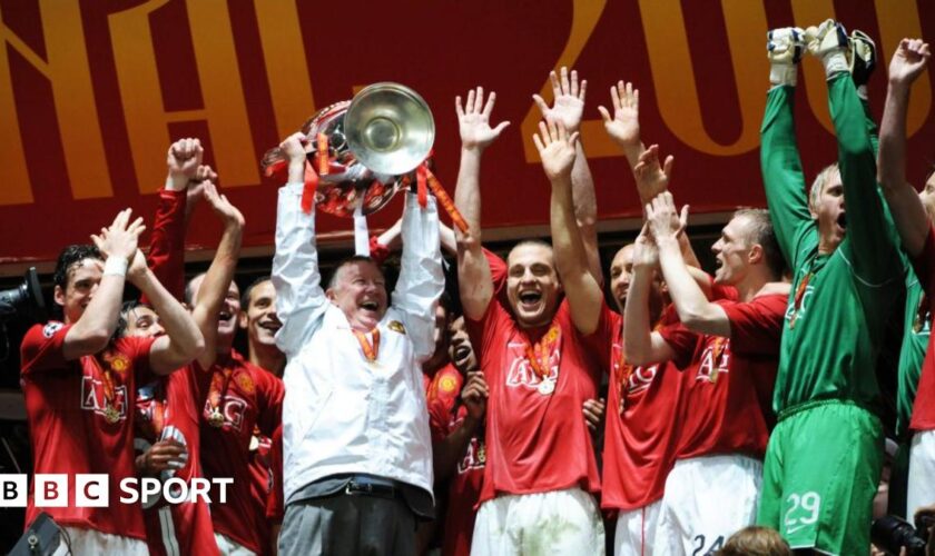 Sir Alex Ferguson lifting the Champions League trophy