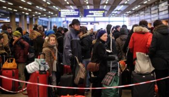 Hundreds of Brits stranded days before Christmas with flights axed as UK lashed by 82mph winds