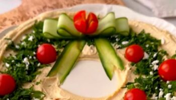 Impress Christmas guests with ultimate snack dish featuring festive bow