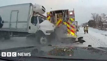 Incredible escape as lorry smashes fire truck on icy US highway