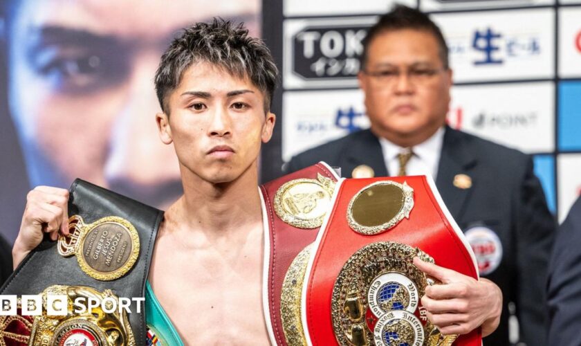 Naoya Inoue with his belts