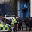 Moment 16 migrants including a child are discovered in a refrigerated lorry after being smuggled into the UK: Driver, 64, arrested 