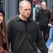 Taron Egerton and new Marvel star girlfriend Chloe Bennett wrap up warm as they enjoy romantic stroll in NYC - just days after confirming romance