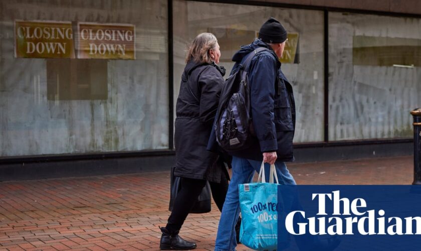 UK economy stagnates as GDP figures revised down