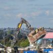 UK's 'ghost city' razed to the ground after flat pack homes stood unfinished for a year