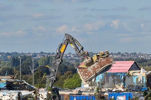 UK's 'ghost city' razed to the ground after flat pack homes stood unfinished for a year