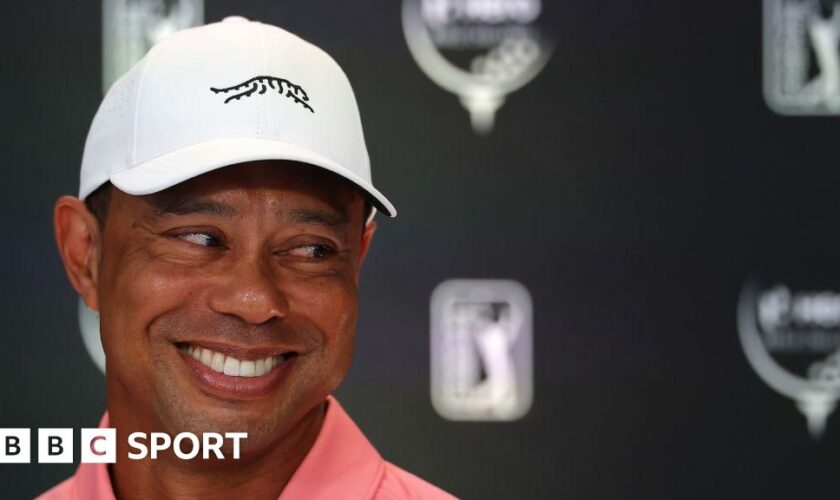 Tiger Woods smiles