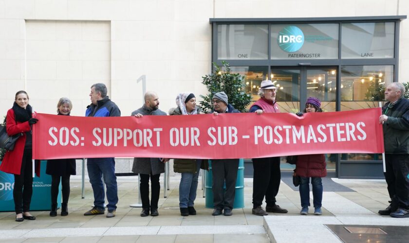 Protestors outside the Post Office Horizon IT inquiry. Pic: PA