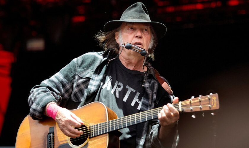 Canadian singer-songwriter Neil Young performs at the Orange Stage at the Roskilde Festival in Roskilde, Denmark, on July 1, 2016. Scanpix Denmark/Nils Meilvang/via REUTERS ATTENTION EDITORS - THIS IMAGE WAS PROVIDED BY A THIRD PARTY. FOR EDITORIAL USE ONLY. DENMARK OUT. NO COMMERCIAL SALES