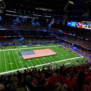 College football fans launch into 'U-S-A!' chant after moment of silence for victims of New Orleans attack