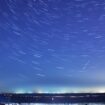 A meteor streaks past stars during the annual Quadrantid meteor shower in Qingdao, China