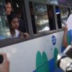 Released prisoners, in a bus, are welcomed by family members and colleagues after they left Insein Prison Saturday, Jan. 4, 2025, in Yangon, Myanmar, as the military government has released more than 6,000 prisoners and has reduced other inmates... sentences as part of a mass amnesty to mark the 77th anniversary of independence from Britain. (AP Photo/Thein Zaw)