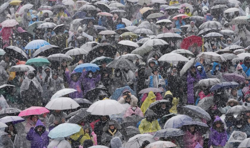 Supporters of impeached South Korean President Yoon Suk Yeol attend a Sunday service as they gather to oppose his impeachment near the presidential residence in Seoul, South Korea, Sunday, Jan. 5, 2025. (AP Photo/Ahn Young-joon)