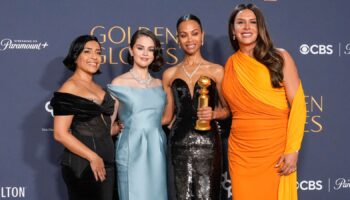 Adriana Paz, from left, Selena Gomez, Zoe Saldana, winner of the award for best performance by a female actor in a supporting role in any motion picture for "Emilia Perez," and Karla Sofia Gascon pose in the press room during the 82nd Golden Globes on Sunday, Jan. 5, 2025, at the Beverly Hilton in Beverly Hills, Calif. (AP Photo/Chris Pizzello)