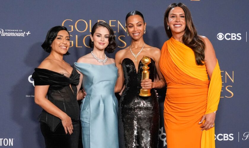 Adriana Paz, from left, Selena Gomez, Zoe Saldana, winner of the award for best performance by a female actor in a supporting role in any motion picture for "Emilia Perez," and Karla Sofia Gascon pose in the press room during the 82nd Golden Globes on Sunday, Jan. 5, 2025, at the Beverly Hilton in Beverly Hills, Calif. (AP Photo/Chris Pizzello)