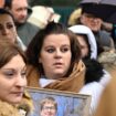 Severine (C), the mother of 13-year old Lucas, and relatives are pictured during a rally in his tribute following his suicide in Epinal, eastern France, on February 5, 2023. Severine (whose family name is not made available for privacy) said that the harassment and bullying suffered by his son at school because of his homosexuality had clearly been the "trigger" for his act. (Photo by Jean-Christophe Verhaegen / AFP)